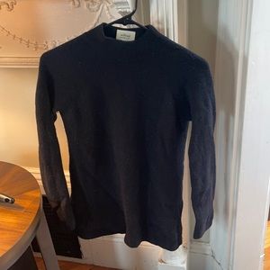 Wilfred wool sweater with open back detail.